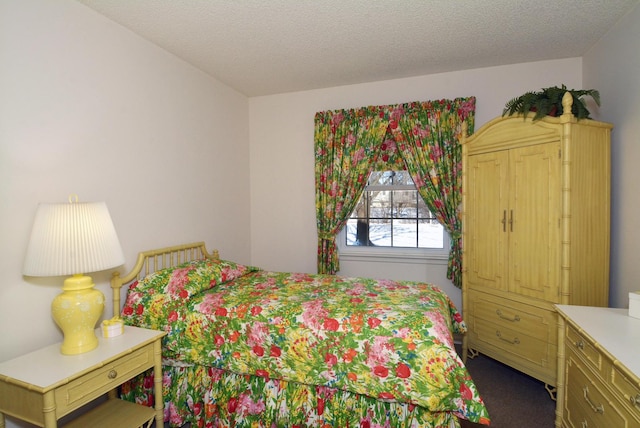 bedroom with a textured ceiling