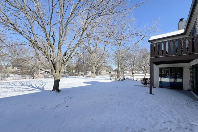 view of snowy yard