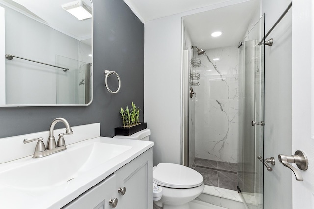 bathroom with vanity, toilet, and an enclosed shower