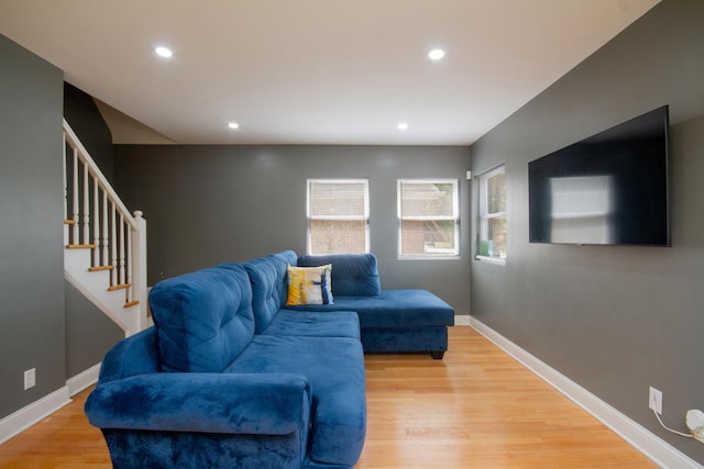 living room with light hardwood / wood-style flooring