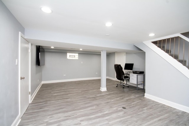 unfurnished office featuring light wood-type flooring