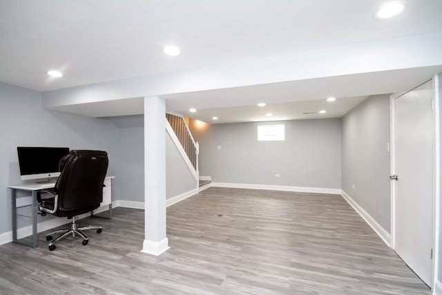 office space with light wood-type flooring