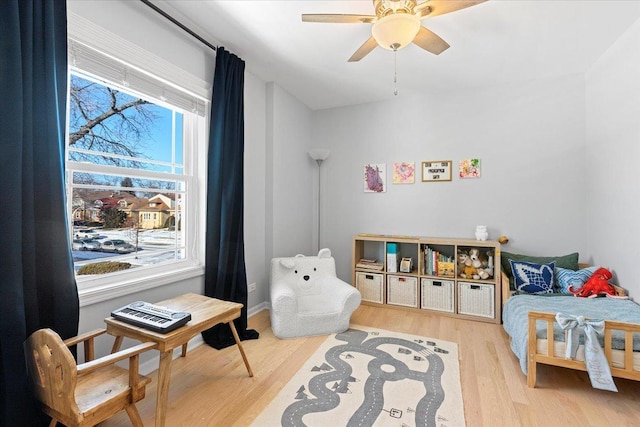 interior space featuring ceiling fan and hardwood / wood-style flooring