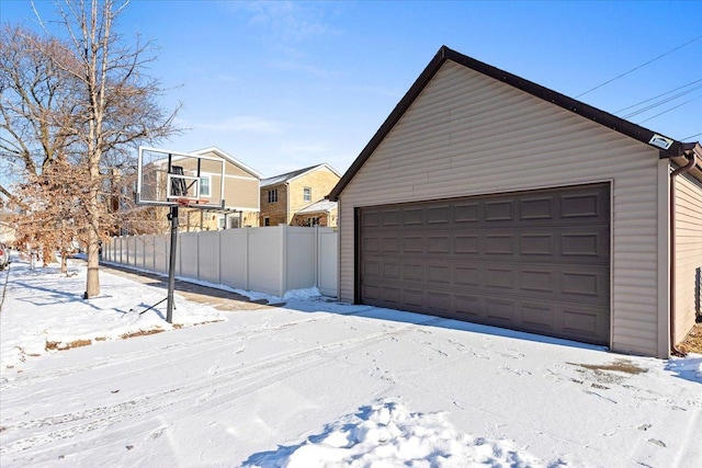 view of snow covered garage