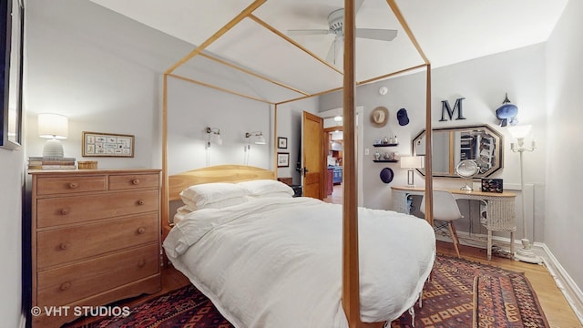 bedroom featuring ceiling fan and wood-type flooring