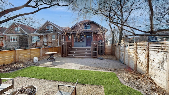 rear view of house featuring a patio area