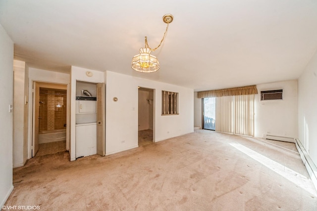 unfurnished living room with light colored carpet and an AC wall unit