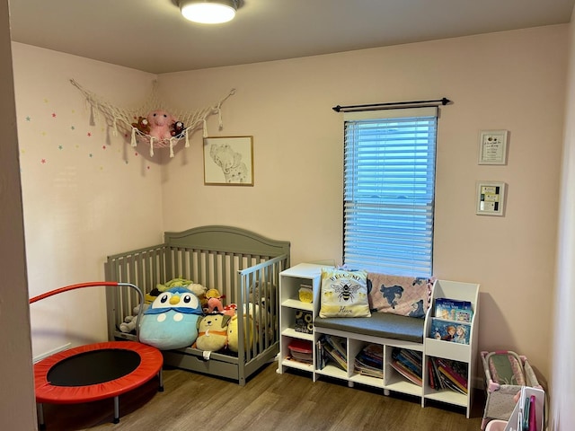 bedroom featuring wood finished floors