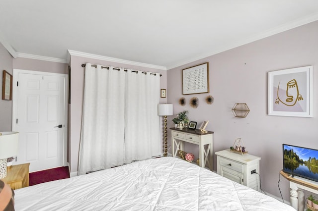 bedroom with crown molding