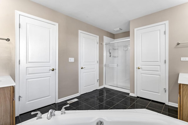 bathroom featuring vanity, separate shower and tub, and tile patterned flooring