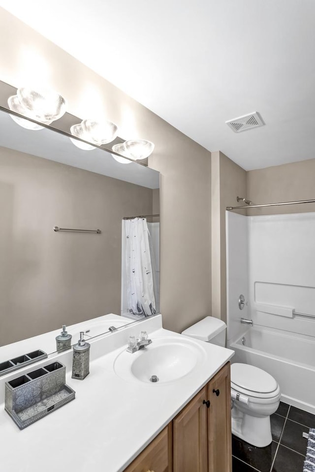 full bathroom with toilet, vanity, shower / bath combo, and tile patterned flooring