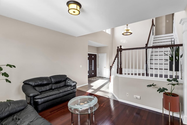 living room featuring dark wood-type flooring