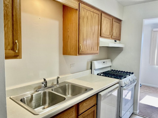 kitchen with sink and white appliances