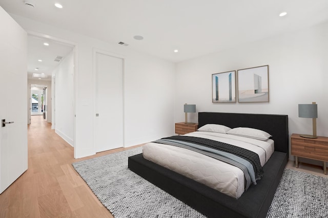 bedroom featuring light hardwood / wood-style floors