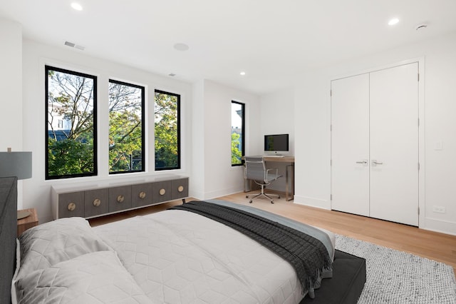 bedroom featuring hardwood / wood-style flooring