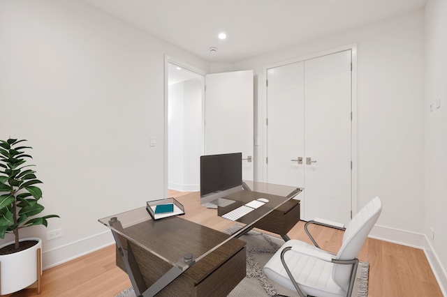 office space featuring light hardwood / wood-style floors