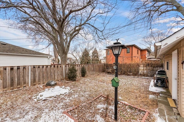 view of yard covered in snow