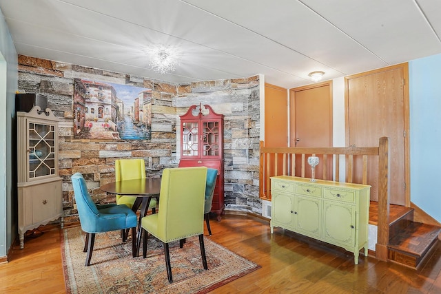 dining room with wood-type flooring