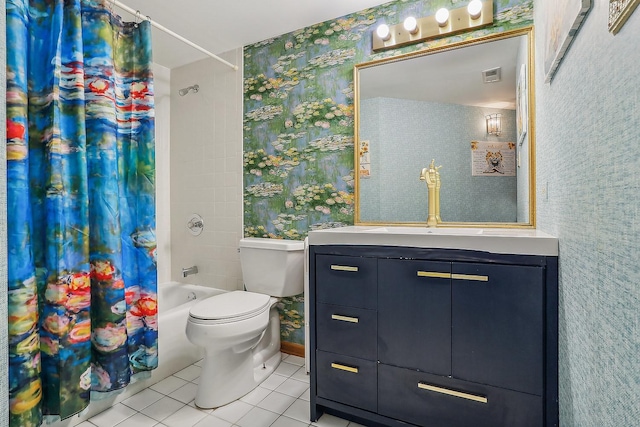 full bathroom with tile patterned floors, vanity, toilet, and shower / bath combo