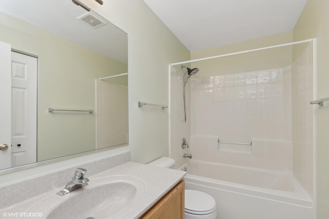 full bathroom with vanity, shower / bathtub combination, and toilet