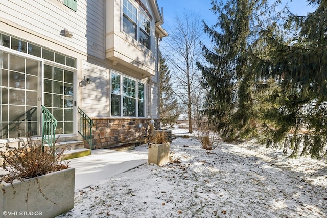 view of yard covered in snow