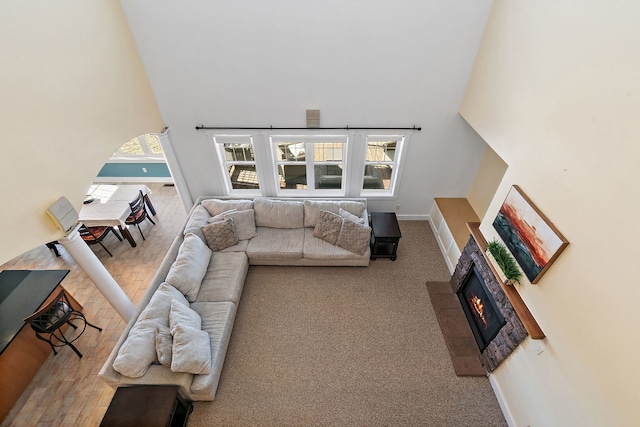 living room with a towering ceiling