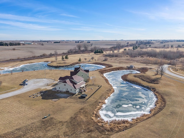 birds eye view of property with a rural view