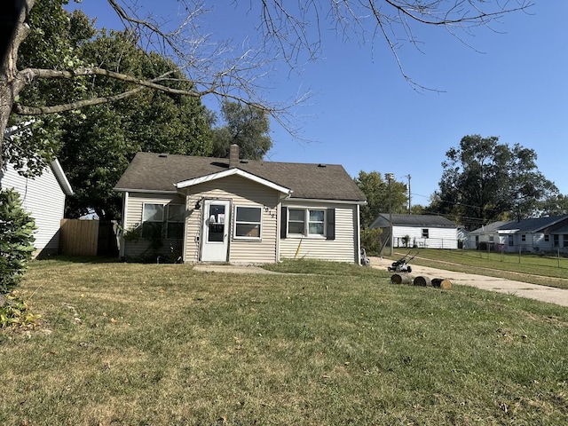 view of front of home with a front yard