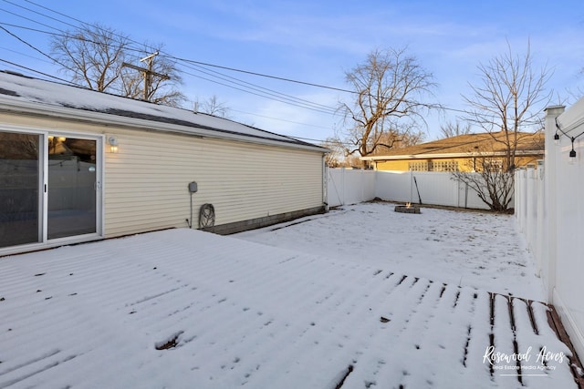 view of yard covered in snow