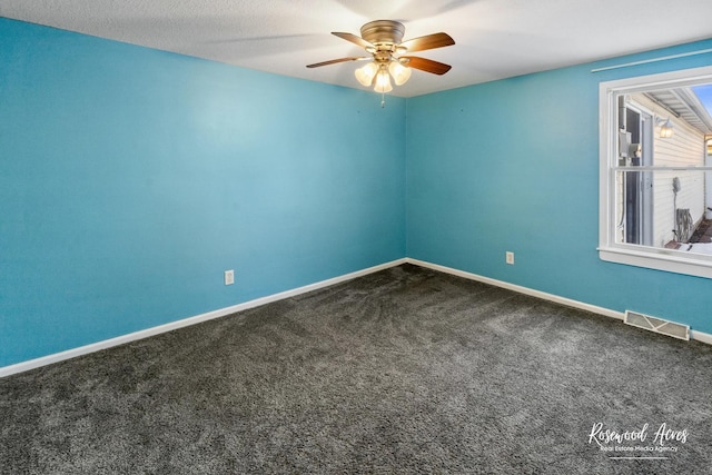 carpeted empty room with ceiling fan