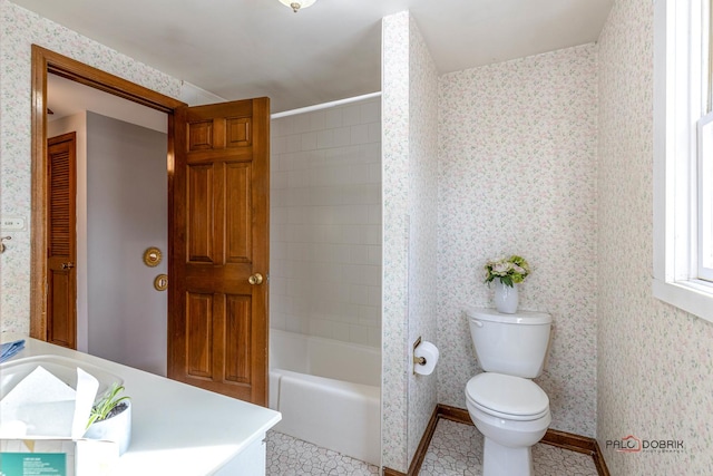 full bathroom with toilet, vanity, and wallpapered walls