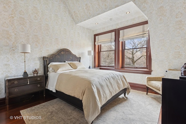 915 N Dearborn St, Chicago, IL 60610 - bedroom with baseboards, wood finished floors, and wallpapered walls