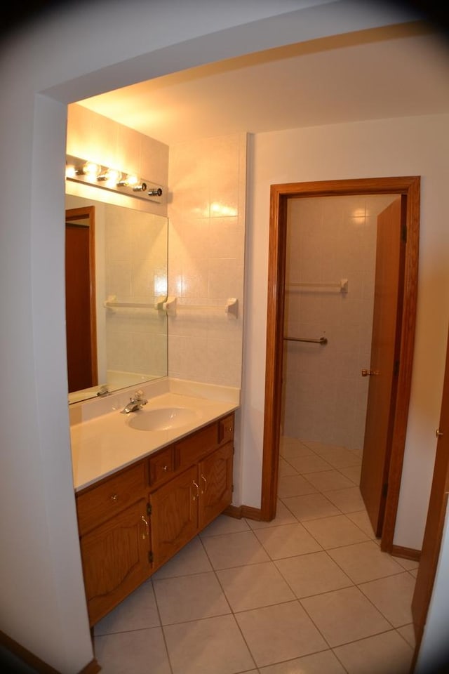 bathroom featuring tile patterned floors and vanity