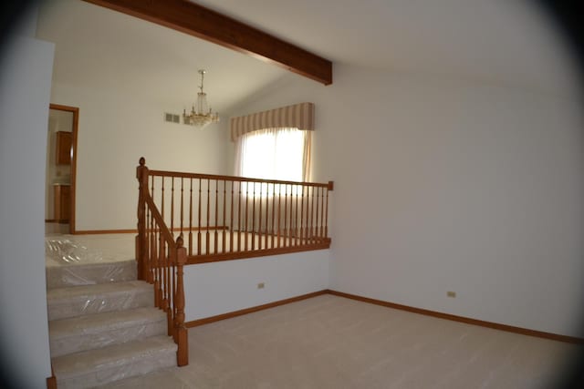 stairway featuring an inviting chandelier, carpet flooring, and lofted ceiling with beams