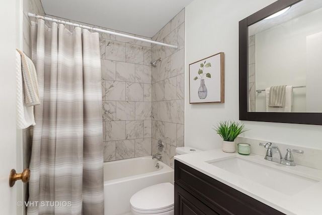 full bathroom featuring vanity, toilet, and shower / bath combo with shower curtain