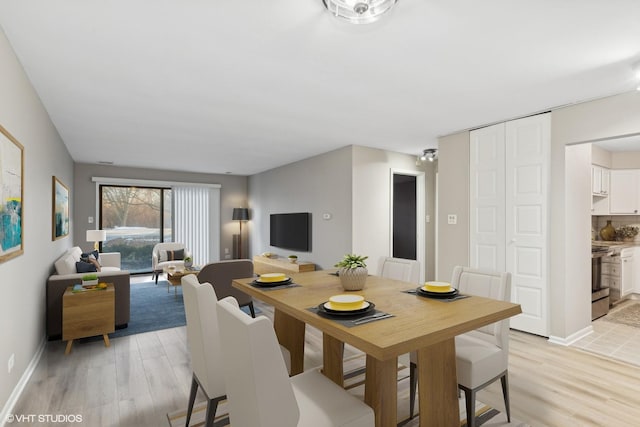 dining area featuring light hardwood / wood-style floors