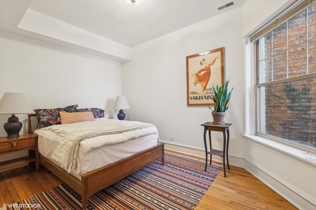 bedroom featuring hardwood / wood-style flooring