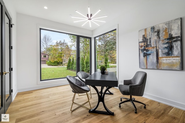 interior space with plenty of natural light and a notable chandelier