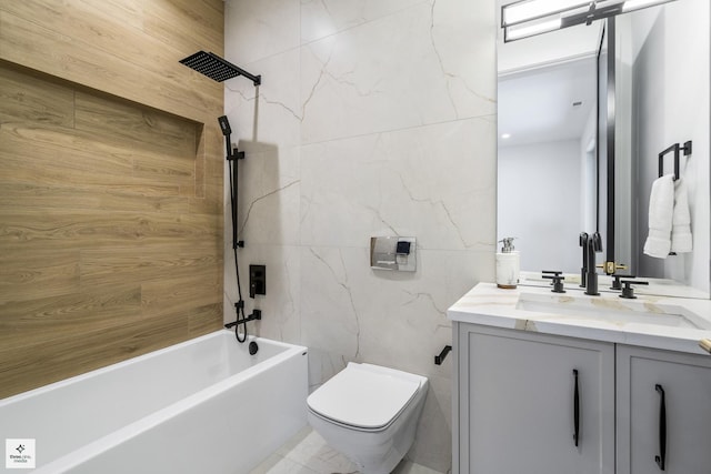 full bathroom with toilet, tile walls, shower / bathtub combination, and vanity