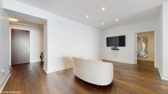 living area featuring dark hardwood / wood-style flooring