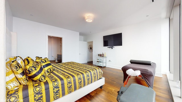 bedroom featuring wood-type flooring