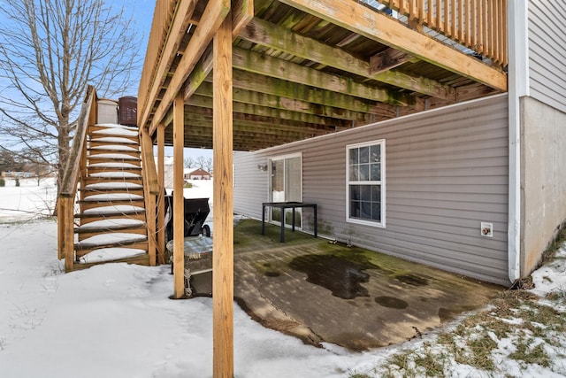 view of snow covered patio