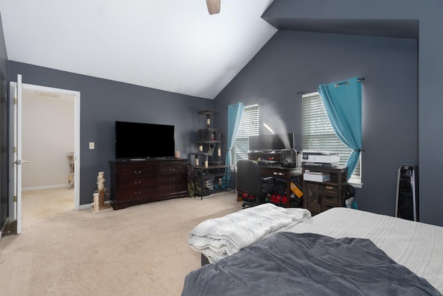 carpeted bedroom featuring high vaulted ceiling and ceiling fan