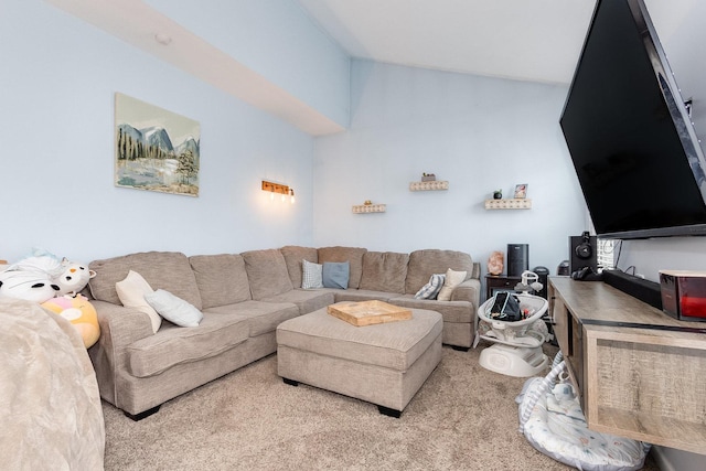 carpeted living room featuring lofted ceiling