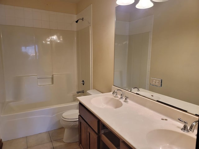 full bathroom featuring toilet, tile patterned flooring, washtub / shower combination, and vanity