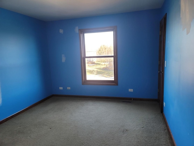 view of carpeted spare room