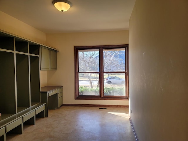 mudroom with built in desk