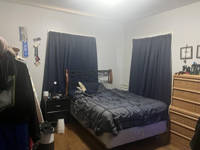 bedroom featuring hardwood / wood-style flooring