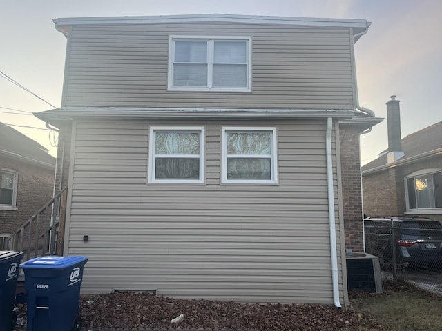 view of property exterior with cooling unit