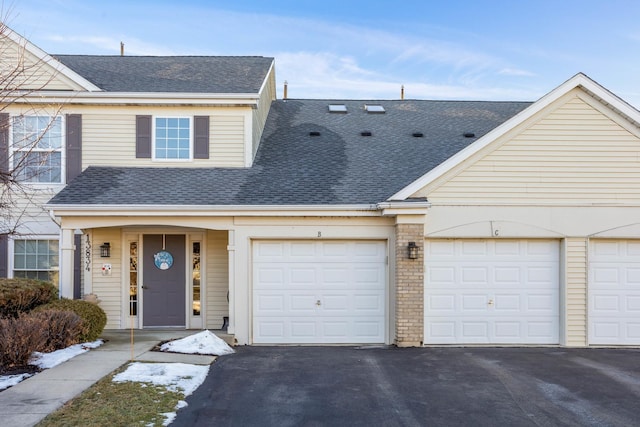 view of front of property with a garage